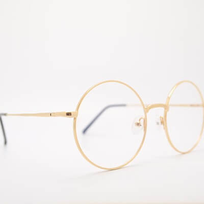 Merkmal Brillenversicherung goldene brille