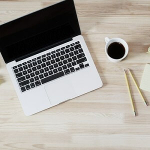 Abschluss Sterbegeldversicherung laptop arbeit